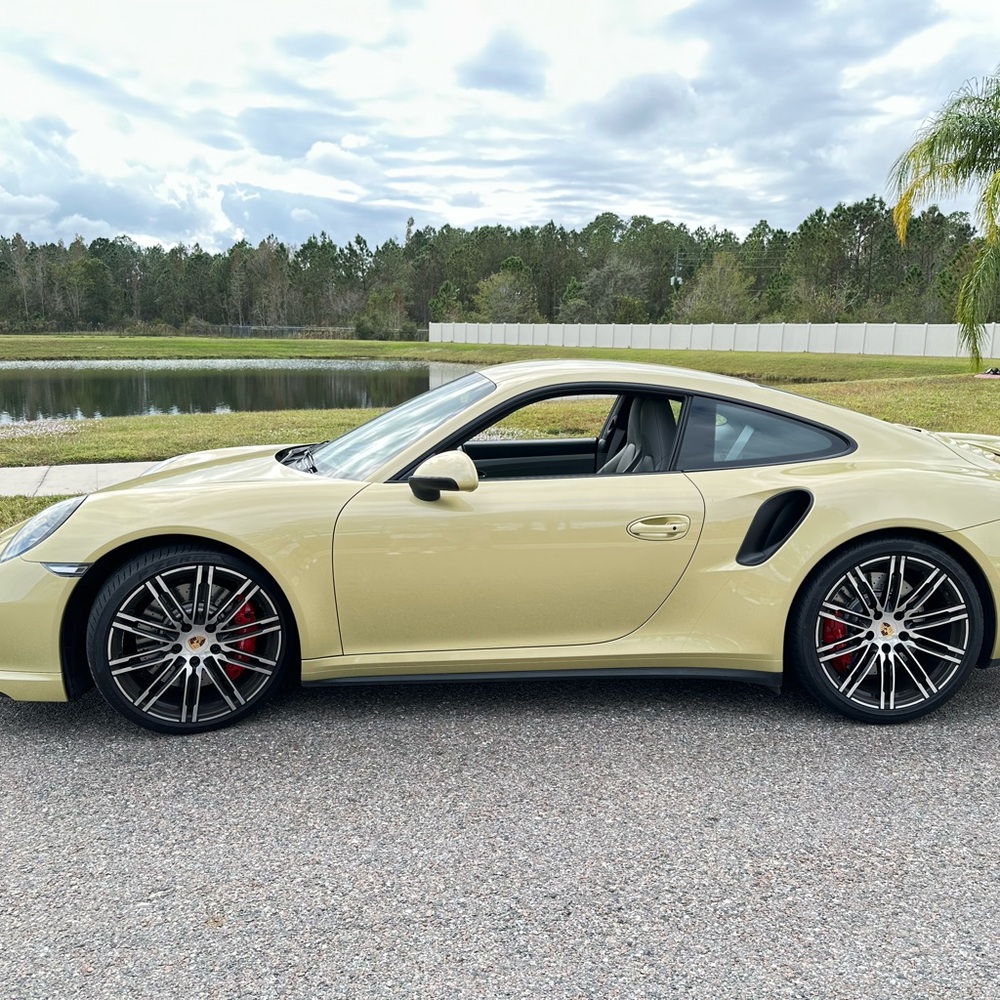 Limegold 2015 Porsche 911 turbo 20,000 miles